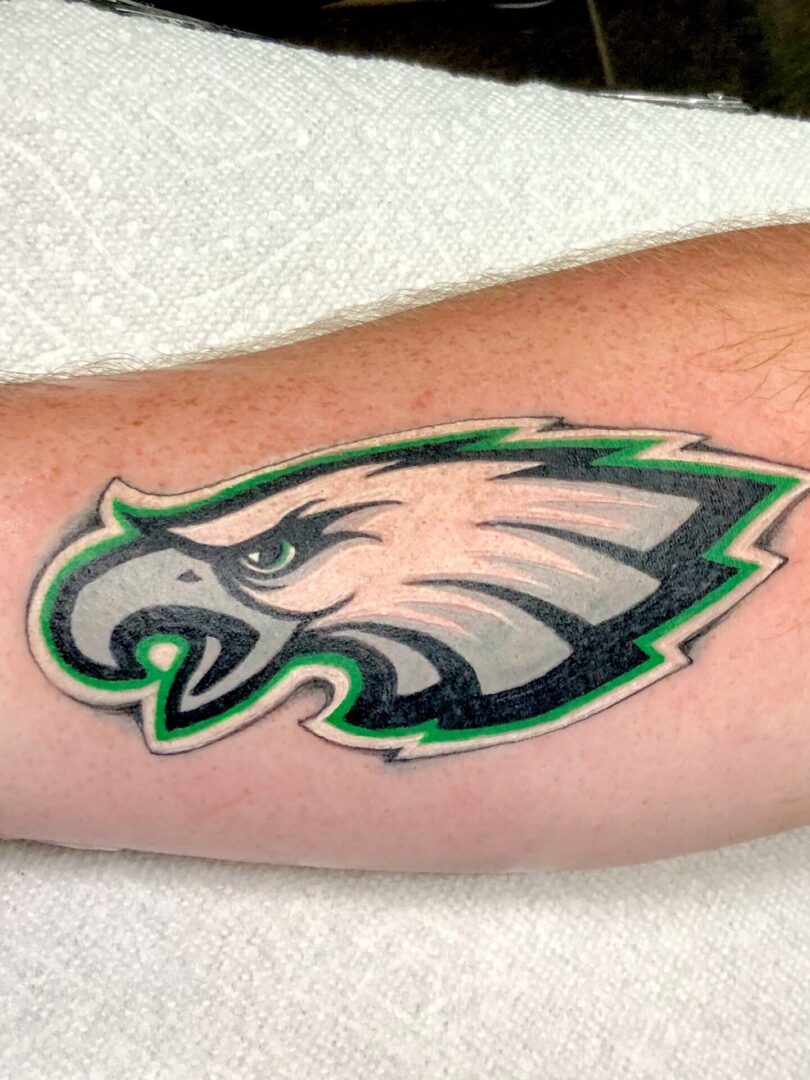 A tattoo of an eagle on the arm.