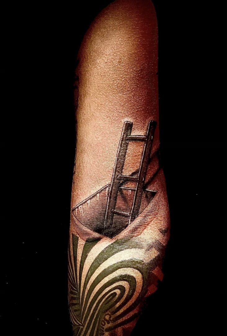 A tattoo of a chair and a spiral