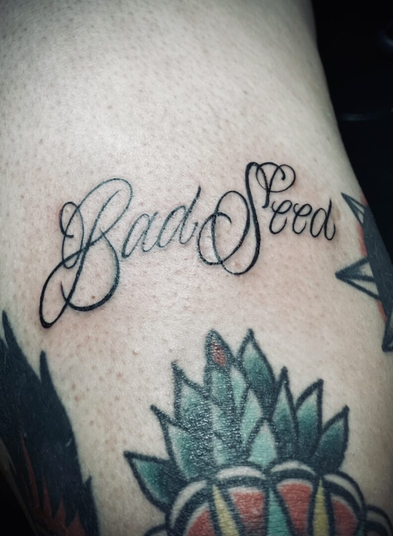 A tattoo that reads 