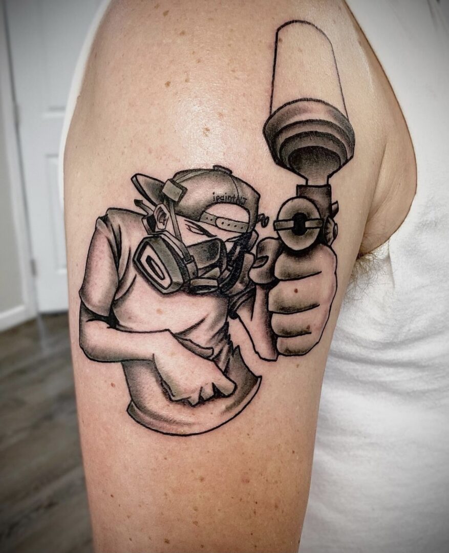 A person with a gas mask on their arm