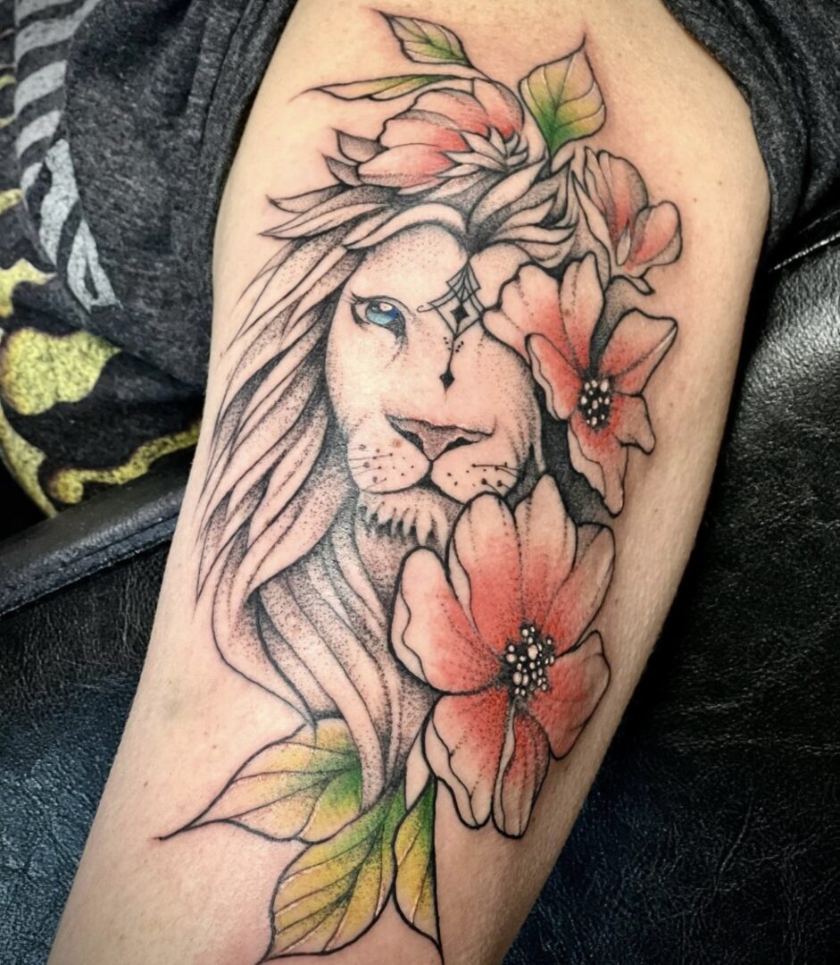 A lion with flowers on his arm